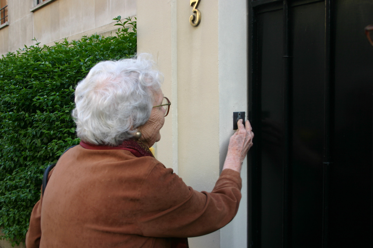 2. Mom Pushing Olivia&#39;s doorbell